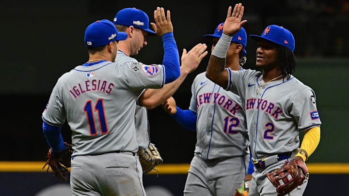Oct 1, 2024; Milwaukee, Wisconsin, USA; New York Mets second base Jose Iglesias (11) and shortstop Luisangel Acuna (2) react after the ninth inning against the Milwaukee Brewers in game one of the Wildcard round for the 2024 MLB Playoffs at American Family Field. Mandatory Credit: Benny Sieu-Imagn Images Oct 1, 2024; Milwaukee, Wisconsin, USA; New York Mets second base Jose Iglesias (11) and shortstop Luisangel Acuna (2) react after the ninth inning against the Milwaukee Brewers in game one of the Wildcard round for the 2024 MLB Playoffs at American Family Field. Mandatory Credit: Benny Sieu-Imagn Images