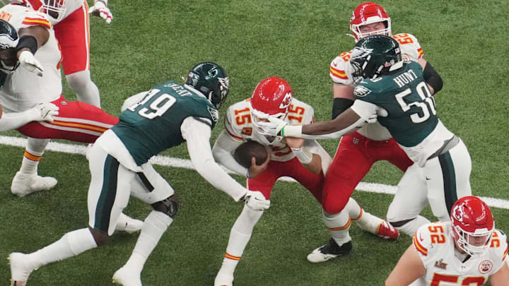 Feb 9, 2025; New Orleans, LA, USA; Kansas City Chiefs quarterback Patrick Mahomes (15) is pressured by Philadelphia Eagles linebacker Josh Sweat (19) and linebacker Jalyx Hunt (58) during Super Bowl LIX at Caesars Superdome. Mandatory Credit: James Lang-Imagn Images Feb 9, 2025; New Orleans, LA, USA; Kansas City Chiefs quarterback Patrick Mahomes (15) is pressured by Philadelphia Eagles linebacker Josh Sweat (19) and linebacker Jalyx Hunt (58) during Super Bowl LIX at Caesars Superdome. Mandatory Credit: James Lang-Imagn Images