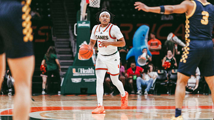 Nijel Pack (24) dribbling the ball up court against Coppin State