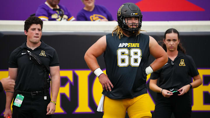 Sep 14, 2024; Greenville, North Carolina, USA;  Appalachian State Mountaineers offensive lineman Jack Hollifield (68) looks on before the game during the warmups against the East Carolina Pirates at Dowdy-Ficklen Stadium. Mandatory Credit: James Guillory-Imagn Images