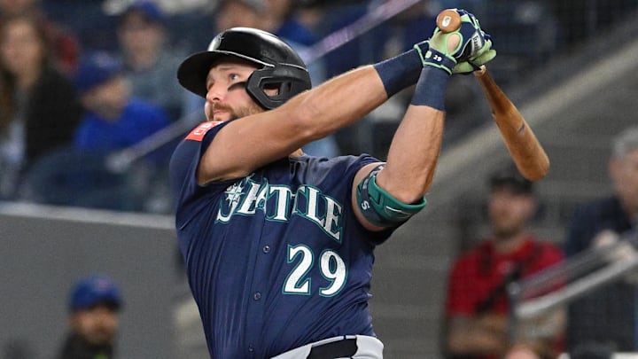 Seattle Mariners catcher Cal Raleigh hits a home run against the Toronto Blue Jays on April 20 at Rogers Centre. Seattle Mariners catcher Cal Raleigh hits a home run against the Toronto Blue Jays on April 20 at Rogers Centre.