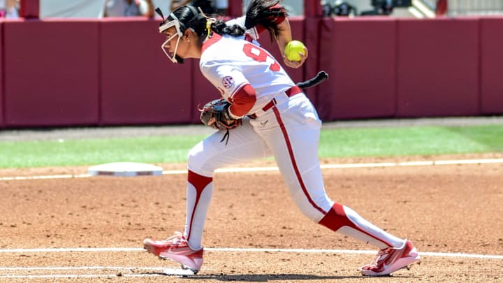 Oklahoma pitcher Miali Guachino delivers in an NCAA Tournament contest against Kansas at Love's Field. Oklahoma pitcher Miali Guachino delivers in an NCAA Tournament contest against Kansas at Love's Field.