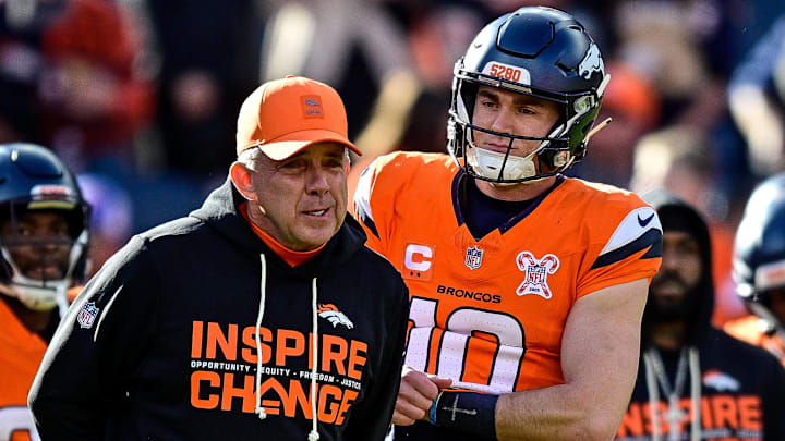 DENVER, CO - DECEMBER 21: Denver Broncos head coach Sean Payton and quarterback Bo Nix (10) have a word before a game between the Jacksonville Jaguars and the Denver Broncos at Empower Field at Mile High on December 21, 2025 in Denver, Colorado.