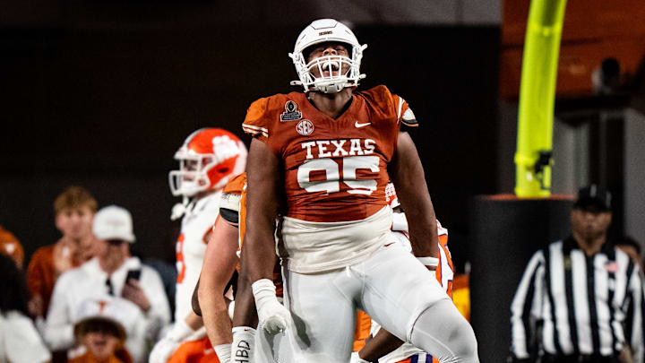 Dec 21, 2024; Austin, Texas, USA; Texas Longhorns defensive lineman Alfred Collins (95) celebrates after a quarterback sack against the Clemson Tigers in the fourth quarter at Darrell K Royal Texas Memorial Stadium. Mandatory Credit: Sara Diggins/USA Today Network via Imagn Images Dec 21, 2024; Austin, Texas, USA; Texas Longhorns defensive lineman Alfred Collins (95) celebrates after a quarterback sack against the Clemson Tigers in the fourth quarter at Darrell K Royal Texas Memorial Stadium. Mandatory Credit: Sara Diggins/USA Today Network via Imagn Images