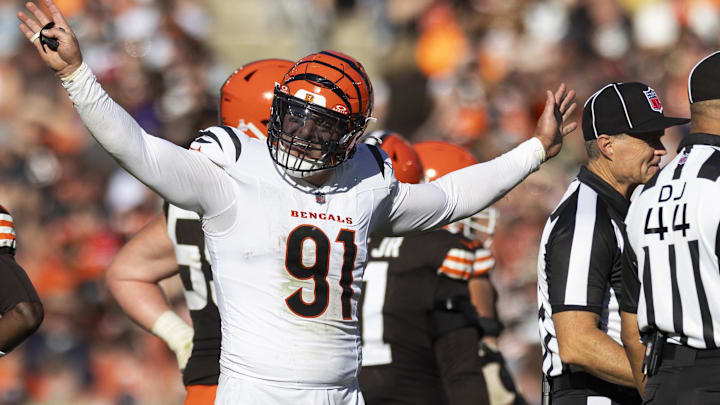 Oct 20, 2024; Cleveland, Ohio, USA; Cincinnati Bengals defensive end Trey Hendrickson (91) reacts following penalty flags being thrown during the fourth quarter against the Cleveland Browns at Huntington Bank Field. The penalties were against the Browns. Mandatory Credit: Scott Galvin-Imagn Images