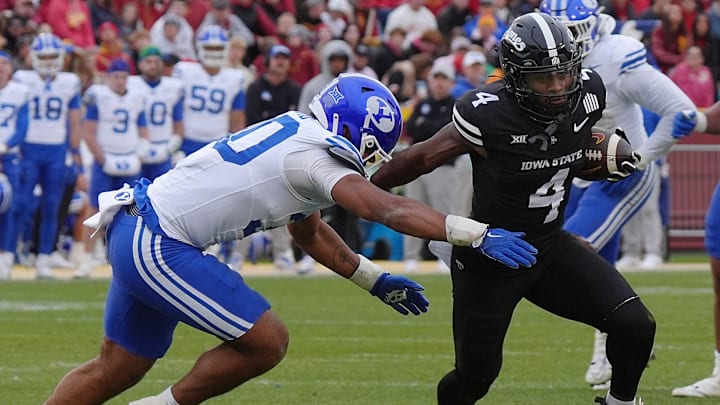 Iowa State Cyclones' wide receiver Xavier Townsend (4) breaks a tackle from BYU Cougars linebacker Max Alford (30) as running for a first down after making a catch during the first quarter at Jack Trice Stadium on Oct. 25, 2025, in Ames, Iowa. Iowa State Cyclones' wide receiver Xavier Townsend (4) breaks a tackle from BYU Cougars linebacker Max Alford (30) as running for a first down after making a catch during the first quarter at Jack Trice Stadium on Oct. 25, 2025, in Ames, Iowa.