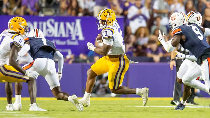 LSU runningback Logan Diggs 3 runs the ball as the LSU Tigers take on the Auburn Tigers at Tiger Stadium in Baton Rouge, Louisiana, Saturday, Oct. 14, 2023.