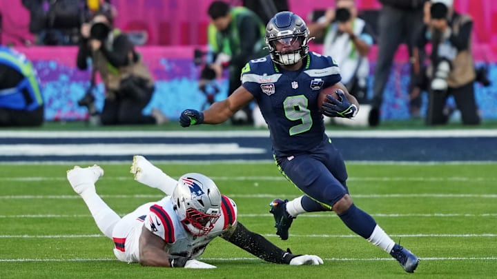 Seattle Seahawks running back Kenneth Walker III runs the ball Seattle Seahawks running back Kenneth Walker III runs the ball