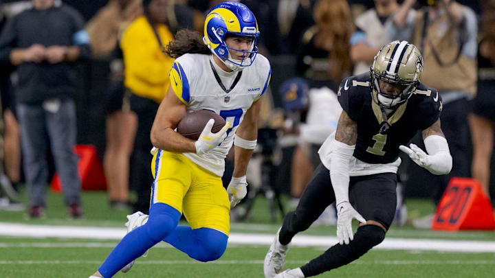 Dec 1, 2024; New Orleans, Louisiana, USA; Los Angeles Rams wide receiver Puka Nacua (17) runs the ball against New Orleans Saints cornerback Alontae Taylor (1) during the second half at Caesars Superdome. Mandatory Credit: Matthew Hinton-Imagn Images Dec 1, 2024; New Orleans, Louisiana, USA; Los Angeles Rams wide receiver Puka Nacua (17) runs the ball against New Orleans Saints cornerback Alontae Taylor (1) during the second half at Caesars Superdome. Mandatory Credit: Matthew Hinton-Imagn Images
