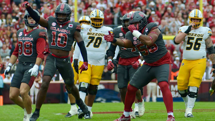 Oklahoma linebacker Kip Lewis, defensive tackle Gracen Halton