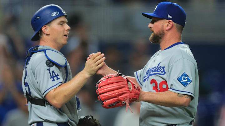 May 5, 2025; Miami, Florida, USA; Los Angeles Dodgers relief pitcher Kirby Yates (38) celebrates with catcher Will Smith (16) after the game against the Miami Marlins at loanDepot Park. Mandatory Credit: Sam Navarro-Imagn Images May 5, 2025; Miami, Florida, USA; Los Angeles Dodgers relief pitcher Kirby Yates (38) celebrates with catcher Will Smith (16) after the game against the Miami Marlins at loanDepot Park. Mandatory Credit: Sam Navarro-Imagn Images