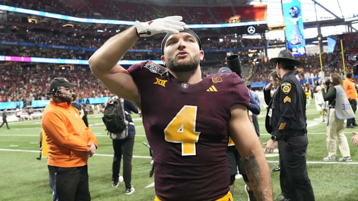 Arizona State running back Cam Skattebo (4) blows a kiss toward fans after Texas won 39-31 in double overtime in the Chick-fil-A Peach Bowl in Atlanta on Jan. 1, 2025. Arizona State running back Cam Skattebo (4) blows a kiss toward fans after Texas won 39-31 in double overtime in the Chick-fil-A Peach Bowl in Atlanta on Jan. 1, 2025.