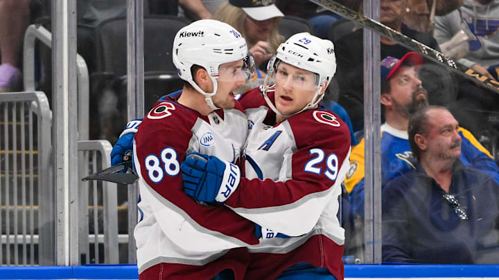 Apr 7, 2026; St. Louis, Missouri, USA; Colorado Avalanche center Martin Necas (88) celebrates with center Nathan MacKinnon (29) after scoring against the St. Louis Blues during the first period at Enterprise Center. Mandatory Credit: Jeff Curry-Imagn Images