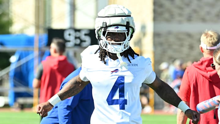 Jul 23, 2025; Rochester, NY, USA; Buffalo Bills running back James Cook (4) warms up during training camp at St. John Fisher University.