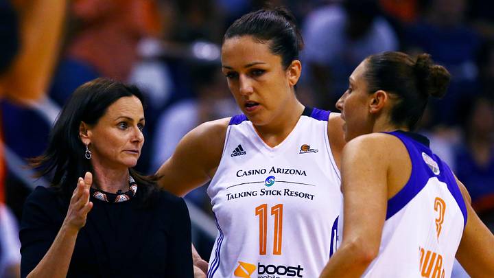 Sep 9, 2014; Phoenix, AZ, USA; Phoenix Mercury head coach Sandy Brondello (left) talks with center Ewelina Kobryn (11) and guard Diana Taurasi (3) against the Chicago Sky during game two of the WNBA Finals at US Airways Center. The Mercury defeated the Sky 97-68. Mandatory Credit: Mark J. Rebilas-Imagn Images