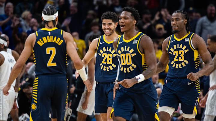 Mar 19, 2025; Indianapolis, Indiana, USA;  Indiana Pacers guard Andrew Nembhard (2) celebrates the Go ahead basket with teammates in the second half against the Dallas Mavericks at Gainbridge Fieldhouse. Mandatory Credit: Trevor Ruszkowski-Imagn Images