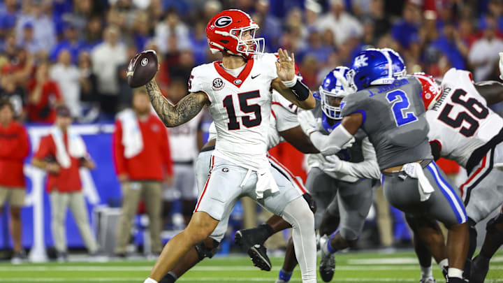 Sep 14, 2024; Lexington, Kentucky, USA; Georgia Bulldogs quarterback Carson Beck (15) drops back to pass against the Kentucky Wildcats during the first quarter at Kroger Field. Mandatory Credit: Carter Skaggs-Imagn Images Sep 14, 2024; Lexington, Kentucky, USA; Georgia Bulldogs quarterback Carson Beck (15) drops back to pass against the Kentucky Wildcats during the first quarter at Kroger Field. Mandatory Credit: Carter Skaggs-Imagn Images
