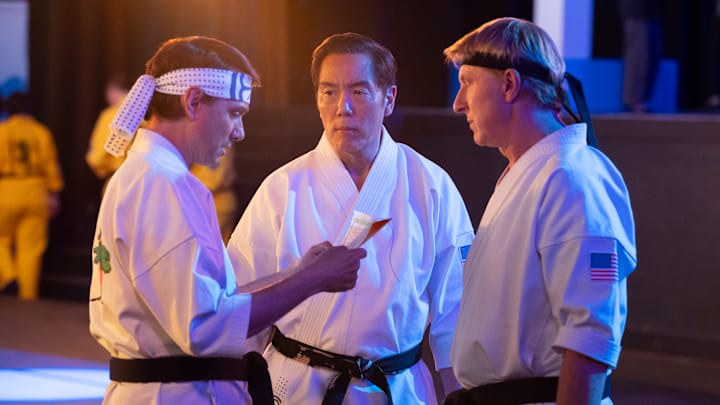 Cobra Kai. (L to R) Ralph Macchio as Daniel LaRusso, Yuji Okumoto as Chozen, William Zabka as Johnny Lawrence in Cobra Kai. Cr. Curtis Bonds Baker/Netflix © 2024