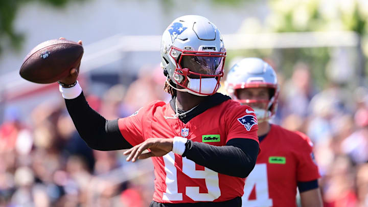 Jul 26, 2024; Foxborough, MA, USA; New England Patriots quarterback Joe Milton III (19) throws a pass during training camp at Gillette Stadium. Mandatory Credit: Eric Canha-USA TODAY Sports