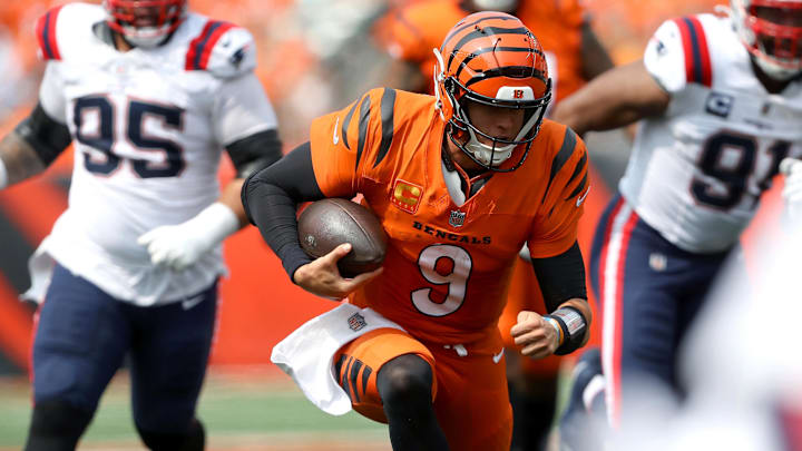 Sep 8, 2024; Cincinnati, Ohio, USA; Cincinnati Bengals quarterback Joe Burrow (9) runs the ball during the third quarter against the New England Patriots at Paycor Stadium. Mandatory Credit: Joseph Maiorana-Imagn Images Sep 8, 2024; Cincinnati, Ohio, USA; Cincinnati Bengals quarterback Joe Burrow (9) runs the ball during the third quarter against the New England Patriots at Paycor Stadium. Mandatory Credit: Joseph Maiorana-Imagn Images