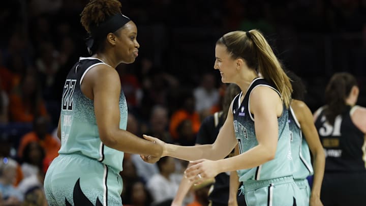 Jun 5, 2025; Washington, District of Columbia, USA; New York Liberty forward Kennedy Burke (22) celebrates with Liberty guard Sabrina Ionescu (20) against the Washington Mystics in the second half at Entertainment & Sports Arena. Mandatory Credit: Geoff Burke-Imagn Images