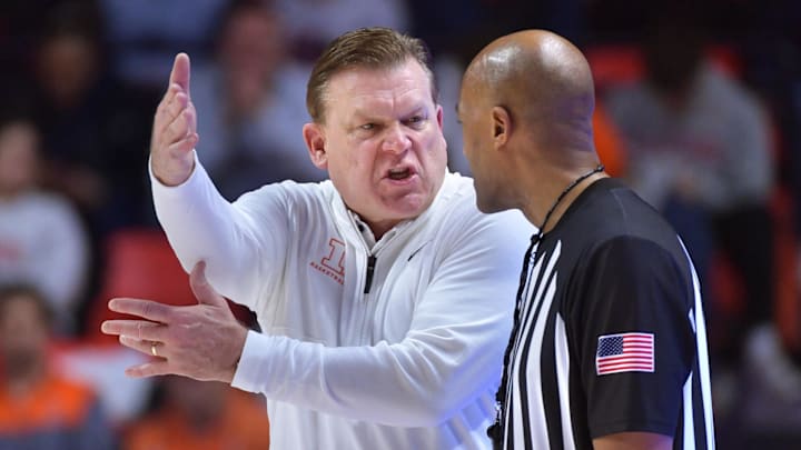 Feb 11, 2025; Champaign, Illinois, USA; Illinois Fighting Illini head coach Brad Underwood reacts to a call by an official during the second half against the UCLA Bruins at State Farm Center. Mandatory Credit: Ron Johnson-Imagn Images Feb 11, 2025; Champaign, Illinois, USA; Illinois Fighting Illini head coach Brad Underwood reacts to a call by an official during the second half against the UCLA Bruins at State Farm Center. Mandatory Credit: Ron Johnson-Imagn Images