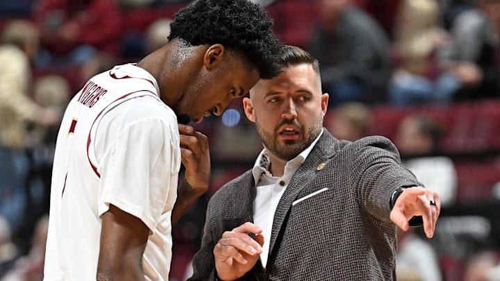 Jan 17, 2026; Tallahassee, Florida, USA; Florida State Seminoles head coach Luke Loucks talks with forward Chauncey Wiggins (7) during the first half against the Wake Forest Demon Deacons at Donald L. Tucker Center. Mandatory Credit: Melina Myers-Imagn Images Jan 17, 2026; Tallahassee, Florida, USA; Florida State Seminoles head coach Luke Loucks talks with forward Chauncey Wiggins (7) during the first half against the Wake Forest Demon Deacons at Donald L. Tucker Center. Mandatory Credit: Melina Myers-Imagn Images