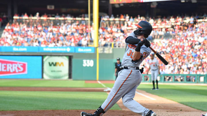 Jul 26, 2023; Philadelphia, Pennsylvania, USA; Baltimore Orioles catcher Adley Rutschman (35) hits a home run against the Philadelphia Phillies