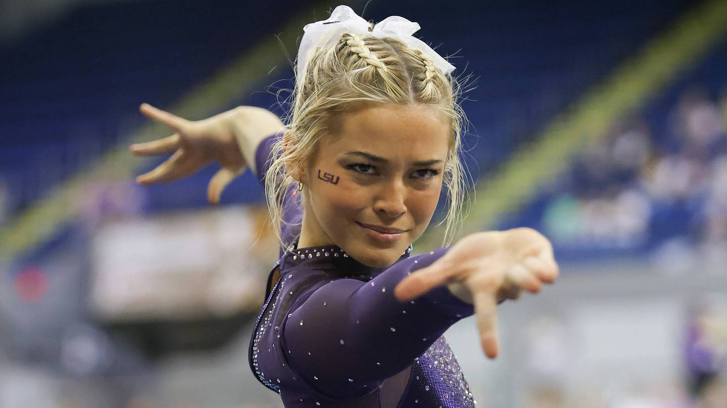 livvy dunne graduation dress flexes LSU in white sleeveless stunner with almost perfect GPA Autumn