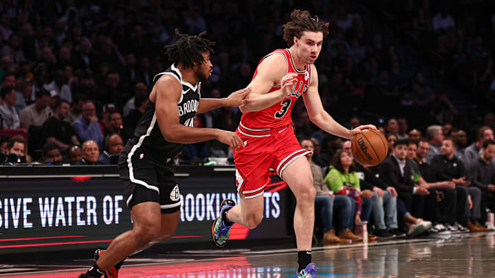 Nov 1, 2024; Brooklyn, New York, USA; Chicago Bulls guard Josh Giddey (3) is guarded by Brooklyn Nets guard Cam Thomas (24) during the first quarter at Barclays Center. Mandatory Credit: Vincent Carchietta-Imagn Images