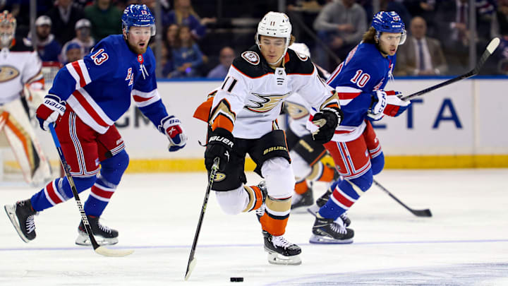 Oct 17, 2022; New York, New York, USA; Anaheim Ducks center Trevor Zegras (11) reaches for the puck