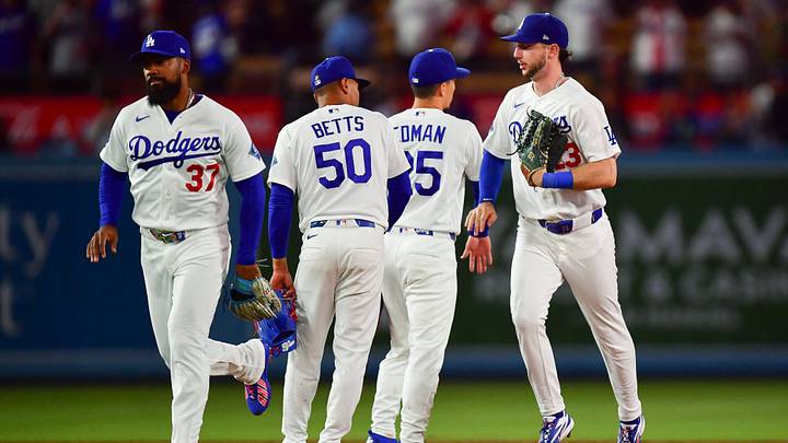 Jul 8, 2026; Los Angeles, California, USA; Los Angeles Dodgers left fielder Teoscar Hernandez (37) shortstop Mookie Betts (50) left fielder Tommy Edman (25) and right fielder Kyle Tucker (23) celebrate the victory against the Colorado Rockies at Dodger Stadium. Mandatory Credit: Gary A. Vasquez-Imagn Images Jul 8, 2026; Los Angeles, California, USA; Los Angeles Dodgers left fielder Teoscar Hernandez (37) shortstop Mookie Betts (50) left fielder Tommy Edman (25) and right fielder Kyle Tucker (23) celebrate the victory against the Colorado Rockies at Dodger Stadium. Mandatory Credit: Gary A. Vasquez-Imagn Images