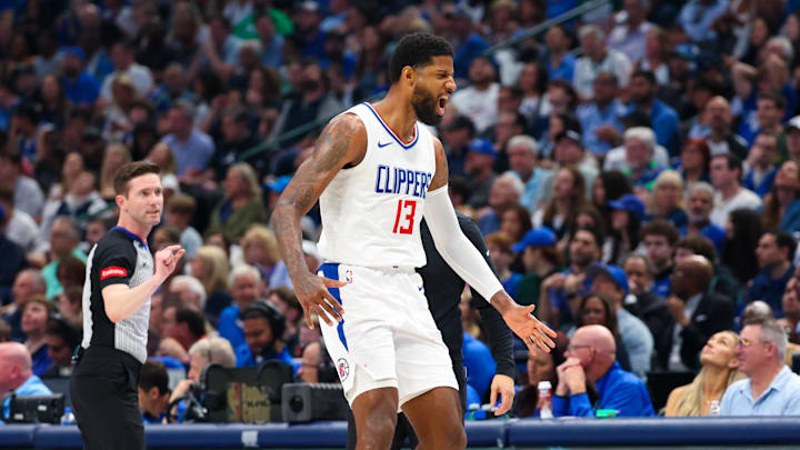Apr 28, 2024; Dallas, Texas, USA;  LA Clippers forward Paul George (13) reacts after scoring during the first quarter against the Dallas Mavericks during game four of the first round for the 2024 NBA playoffs at American Airlines Center. Mandatory Credit: Kevin Jairaj-Imagn Images