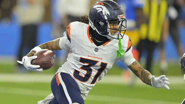 Dec 19, 2024; Inglewood, California, USA;  Denver Broncos cornerback Kris Abrams-Draine (31) runs the ball after an interception in the end zone in the first half against the Los Angeles Chargers at SoFi Stadium. Mandatory Credit: Jayne Kamin-Oncea-Imagn Images