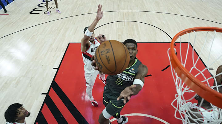 Minnesota Timberwolves shooting guard Anthony Edwards drives to the basket past Portland Trail Blazers forward Toumani Camara during the first half at Moda Center in Portland on Nov. 13, 2024.