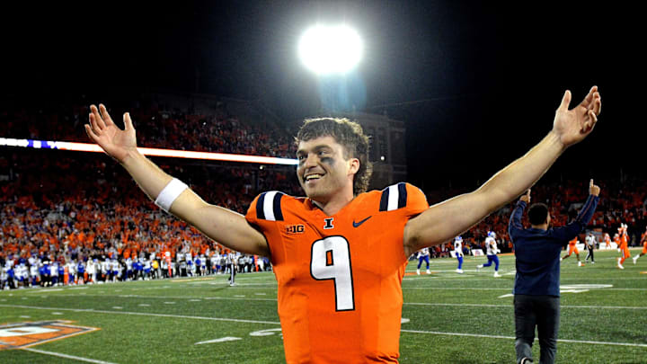 Sep 7, 2024; Champaign, Illinois, USA; Illinois Fighting Illini quarterback Luke Altmyer (9) celebrates a win over the Kansas Jayhawks at Memorial Stadium. Mandatory Credit: Ron Johnson-Imagn Images
