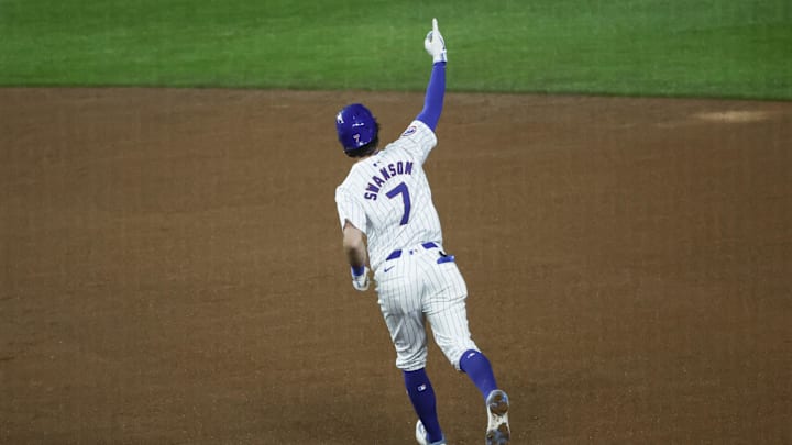 Jun 2, 2024; Chicago, Illinois, USA; Chicago Cubs shortstop Dansby Swanson (7) rounds the bases after hitting a two-run home run against the Cincinnati Reds during the eight inning at Wrigley Field. Mandatory Credit: Kamil Krzaczynski-USA TODAY Sports