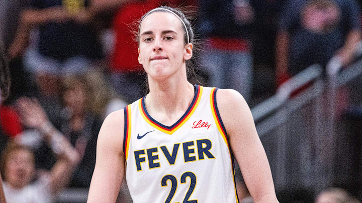 Jul 9, 2025; Indianapolis, Indiana, USA; Indiana Fever guard Caitlin Clark (22) in the first half against Golden State Valkyries at Gainbridge Fieldhouse. Mandatory Credit: Trevor Ruszkowski-Imagn Images