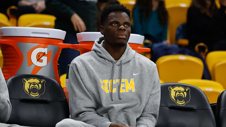Dec 29, 2025; Waco, Texas, USA; Baylor Bears center James Nnaji (46) in street clothes on the bench during the second half against the Arlington Baptist Patriots at Paul and Alejandra Foster Pavilion. Mandatory Credit: Chris Jones-Imagn Images