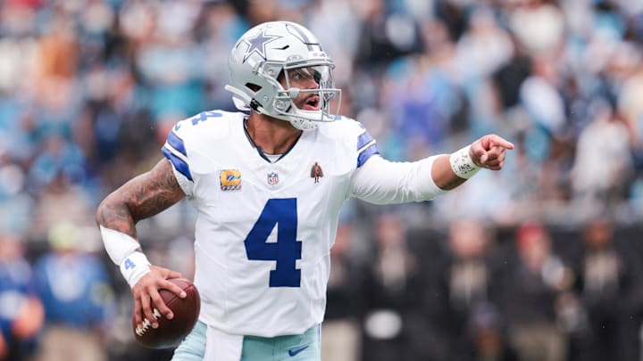 Dallas Cowboys quarterback Dak Prescott directs traffic against the Carolina Panthers at Bank of America Stadium. 