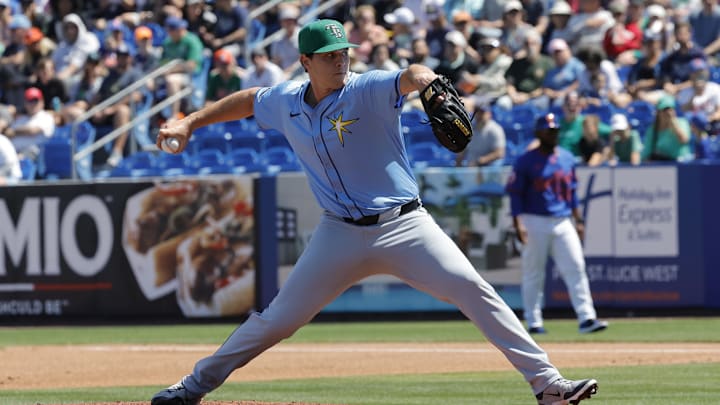 Mar 17, 2025; Port St. Lucie, Florida, USA;  Tampa Bay Rays pitcher Mike Vasil (70) throws a pitch during the first inning against the New York Mets at Clover Park. Mandatory Credit: Reinhold Matay-Imagn Images
