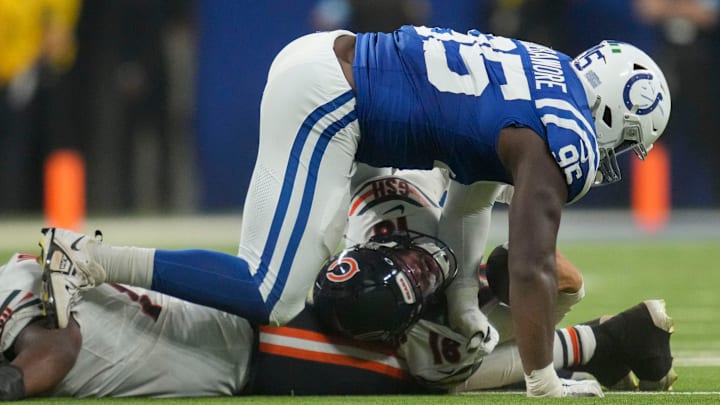Indianapolis Colts defensive tackle Adetomiwa Adebawore (95) tackles Chicago Bears quarterback Caleb Williams (18) on Sunday, Sept. 22, 2024, during a game against the Chicago Bears at Lucas Oil Stadium in Indianapolis. Indianapolis Colts defensive tackle Adetomiwa Adebawore (95) tackles Chicago Bears quarterback Caleb Williams (18) on Sunday, Sept. 22, 2024, during a game against the Chicago Bears at Lucas Oil Stadium in Indianapolis.