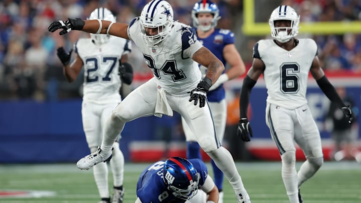 Dallas Cowboys defensive end Marshawn Kneeland reacts after sacking New York Giants quarterback Daniel Jones. Dallas Cowboys defensive end Marshawn Kneeland reacts after sacking New York Giants quarterback Daniel Jones.