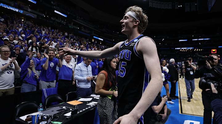 Mar 22, 2025; Denver, CO, USA; Brigham Young Cougars forward Richie Saunders (15) reacts after defeating the Wisconsin Badgers in the second round of the NCAA Tournament  at Ball Arena. Mandatory Credit: Isaiah J. Downing-Imagn Images