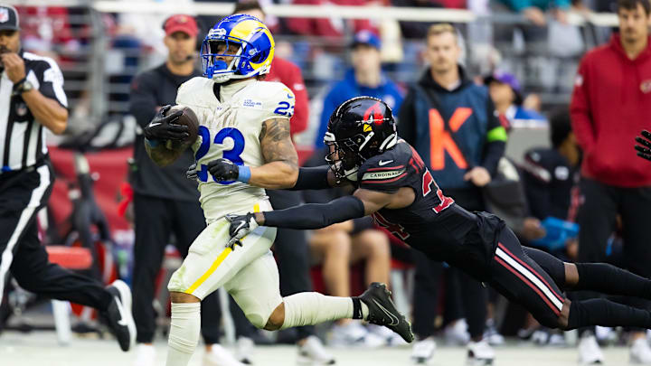 Nov 26, 2023; Glendale, Arizona, USA; Los Angeles Rams running back Kyren Williams (23) is tackled