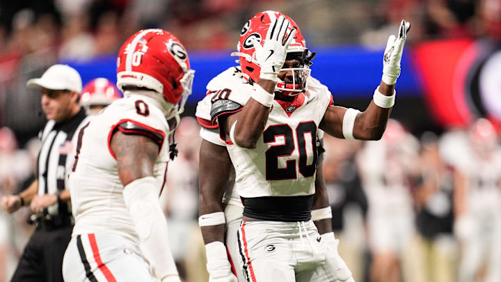 Dec 6, 2025; Atlanta, GA, USA; Georgia Bulldogs defensive back Jacorey Thomas (20) celebrates a sack during the third quarter against the Alabama Crimson Tide during the 2025 SEC Championship game at Mercedes-Benz Stadium. Mandatory Credit: Dale Zanine-Imagn Images Dec 6, 2025; Atlanta, GA, USA; Georgia Bulldogs defensive back Jacorey Thomas (20) celebrates a sack during the third quarter against the Alabama Crimson Tide during the 2025 SEC Championship game at Mercedes-Benz Stadium. Mandatory Credit: Dale Zanine-Imagn Images