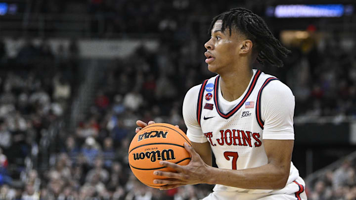 Mar 20, 2025; Providence, RI, USA;  St. John's Red Storm guard Simeon Wilcher (7) controls the ball during the second half against the Omaha Mavericks at Amica Mutual Pavilion. Mandatory Credit: Eric Canha-Imagn Images