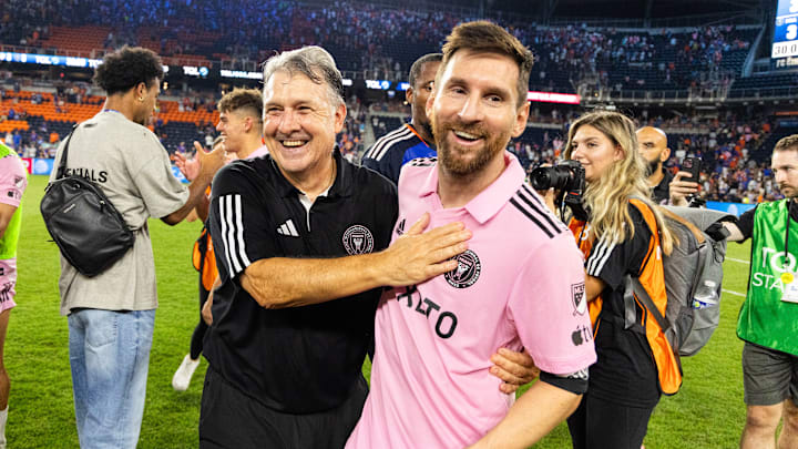 Inter Miami CF coach Gerardo 'Tata' Martino and star forward Lionel Messi celebrate after advancing to the Lamar Hunt U.S. Open Cup final.