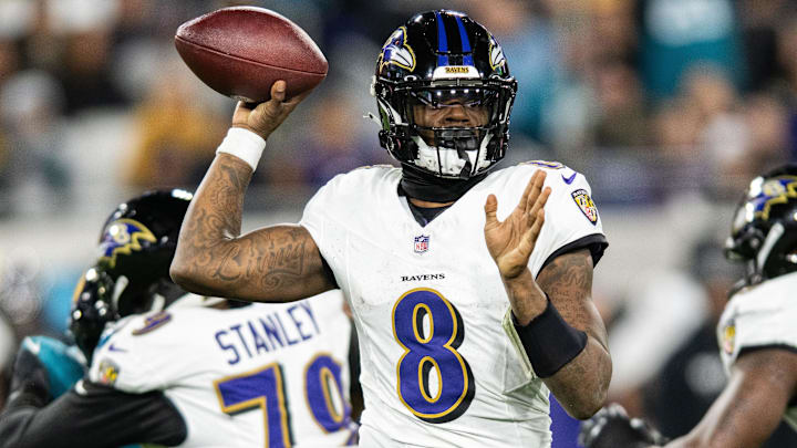 Dec 17, 2023; Jacksonville, Florida, USA; Baltimore Ravens quarterback Lamar Jackson (8) throws the ball against the Jacksonville Jaguars in the second quarter at EverBank Stadium. Mandatory Credit: Jeremy Reper-Imagn Images