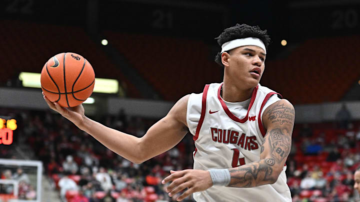Jan 25, 2025; Pullman, Washington, USA; Washington State Cougars forward LeJuan Watts (4) rebounds the ball against the St. Mary's Gaels in the second half at Friel Court at Beasley Coliseum. Mandatory Credit: James Snook-Imagn Images